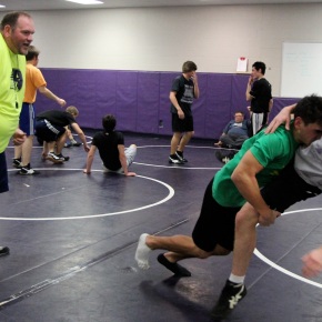 New coaching staff returns former Bison wrestler and coach